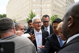 Outgoing Apple CEO Tim Cook arrives at the White House for a state dinner with King Charles